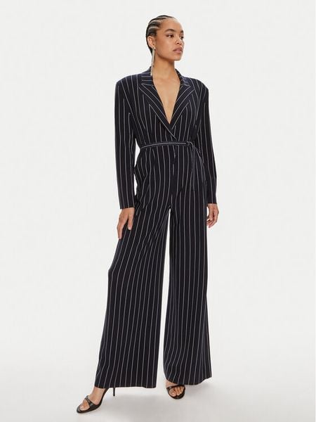 NORMA KAMALI Kombinezon KK124JPL013642 Granatowy Relaxed Fit. Niebieskie sukienki damskie Norma Kamali, s, bez wzorów, z syntetyku, bez kołnierzyka, bez ramiączek. Za 1,639.00 zł.