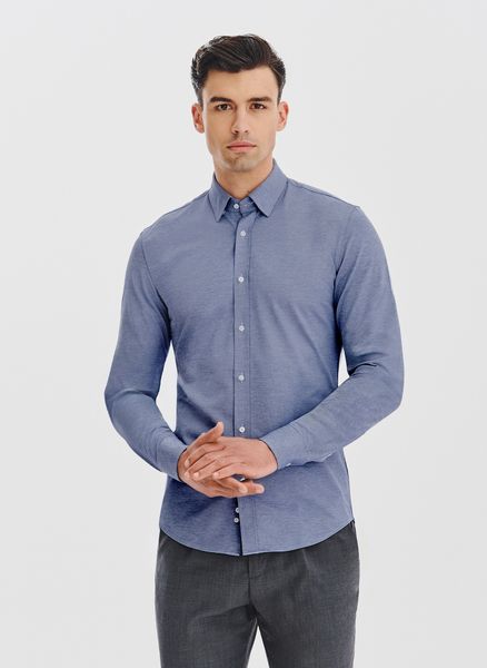 PAKO LORENTE – Niebieska koszula melanż. Niebieskie koszule męskie Pako Lorente, m, bez wzorów, z bawełny, bez kołnierzyka, bez ramiączek. Za 139.99 zł.