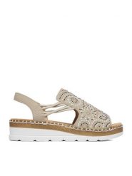 Rieker Sandały CEO-V1246-62 Beżowy. Brązowe sandały damskie Rieker, bez wzorów, ze skóry, bez obcasa, na koturnie, bez zapięcia. Za 329.99 zł.