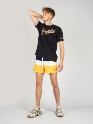 Champion T-Shirt "Giants" | 213338 | Mężczyzna | Czarny. Czarne t-shirty męskie Champion, m, bez wzorów, z bawełny, bez kołnierzyka, bez ramiączek. W wyprzedaży za 79.00 zł.