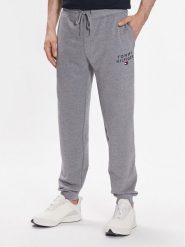 Tommy Hilfiger Spodnie dresowe UM0UM02880 Szary Regular Fit. Szare spodnie sportowe męskie Tommy Hilfiger, m, bez wzorów, z dresówki. Za 259.99 zł.