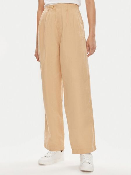 Tommy Hilfiger Spodnie materiałowe WW0WW41355 Beżowy Relaxed Fit. Brązowe spodnie materiałowe damskie Tommy Hilfiger, bez wzorów, z bawełny. Za 399.99 zł.
