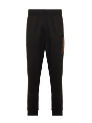 EA7 Emporio Armani Spodnie dresowe 7M002422 AF13512 UC001 Czarny Slim Fit. Czarne spodnie sportowe męskie EA7 Emporio Armani, m, bez wzorów, z bawełny. Za 424.99 zł.