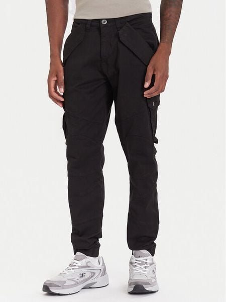 Alpha Industries Spodnie materiałowe Combat 126215 Czarny Slim Fit. Czarne spodnie materiałowe męskie Alpha Industries, bez wzorów, z bawełny. Za 299.00 zł.