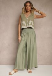 Jasnozielone Spodnie z Wiskozą o Szerokim Kroju High Waist Orrana. Zielone spodnie materiałowe damskie Renee, bez wzorów, z jeansu, eleganckie, z podwyższonym stanem. Za 39.99 zł.