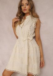 Jasnobeżowa Sukienka Ismeia. Brązowe sukienki damskie Renee, m, bez wzorów, z koronki, boho, bez kołnierzyka, bez ramiączek, mini, dopasowane. Za 159.99 zł.
