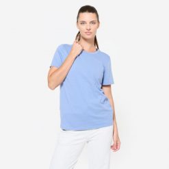 Koszulka damska Domyos Gym & Pilates. Niebieskie bluzki damskie DOMYOS, xl, bez wzorów, z bawełny, sportowe, bez kołnierzyka, bez ramiączek. Za 39.99 zł.