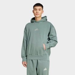 Bluza polarowa z kapturem z efektem sprania ADIDAS ALL SZN. Zielone bluzy sportowe męskie Adidas, m, bez wzorów, z bawełny, z kapturem. Za 309.99 zł.