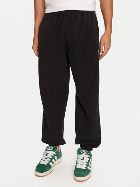 Adidas Spodnie dresowe adicolor 3-Stripes IZ4798 Czarny Regular Fit. Czarne spodnie sportowe męskie Adidas, m, bez wzorów, z dresówki. Za 189.99 zł.