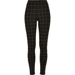 Damskie klasyczne legginsy miejskie z wysoką talią. Białe legginsy damskie Urban Classics, bez wzorów, z elastanu. Za 127.20 zł.