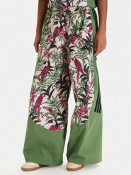 Adidas Spodnie dresowe Farm Rio Premium KD4642 Zielony Loose Fit. Zielone spodnie dresowe damskie Adidas, bez wzorów, z dresówki. Za 529.99 zł.