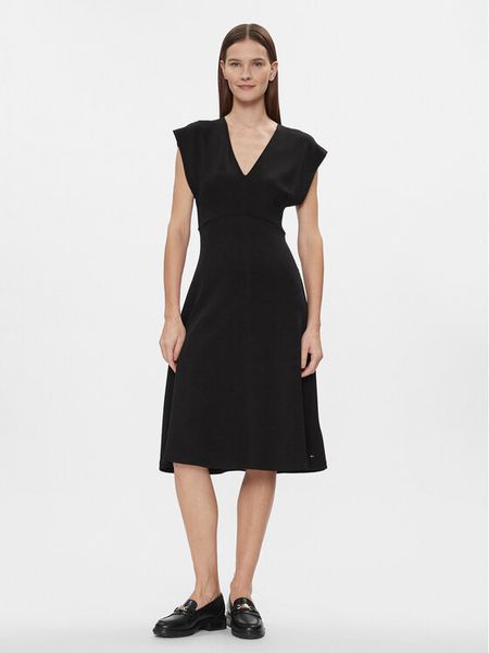 Tommy Hilfiger Sukienka codzienna WW0WW40731 Czarny Regular Fit. Czarne sukienki damskie Tommy Hilfiger, na co dzień, xs, bez wzorów, z bawełny, bez kołnierzyka, bez ramiączek, proste. Za 509.99 zł.