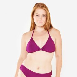 Góra kostiumu kąpielowego surfingowego damska Olaian Mae teksturowana. Fioletowe bikini OLAIAN, bez wzorów, z elastanu. W wyprzedaży za 19.99 zł.