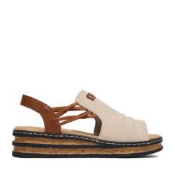 Sandały Rieker. Brązowe sandały damskie Rieker, bez wzorów, bez obcasa, na koturnie, bez zapięcia. Za 299.99 zł.