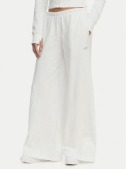 Tommy Jeans Spodnie dresowe Metallic Logo DW0DW22735 Biały Wide Leg. Białe spodnie dresowe damskie Tommy Jeans, bez wzorów, z bawełny. Za 409.99 zł.
