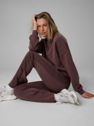 4F Legginsy z rozszerzanymi nogawkami damskie - brązowe XXL. Brązowe legginsy damskie 4F, bez wzorów, z dzianiny. Za 129.99 zł.