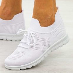 Białe sportowe buty damskie Potocki 16329. Białe obuwie sportowe damskie POTOCKI, na lato, bez wzorów, z dresówki, bez zapięcia, do biegania. Za 89.00 zł.