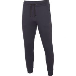 Spodnie dresowe męskie SPMD301 - granat. Spodnie sportowe męskie 4F, m, bez wzorów, z dresówki, climacool (adidas). Za 119.99 zł.