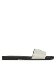 Calvin Klein Jeans Klapki Flat Sandal Slide Mg YW0YW01697 Biały. Białe klapki damskie Calvin Klein Jeans, bez wzorów, z jeansu, bez obcasa, bez zapięcia. Za 209.99 zł.