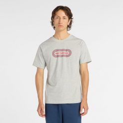 Koszulka męska New Balance MT61C48BAG – szara. Szare koszulki sportowe męskie New Balance, m, z aplikacjami, z bawełny, bez ramiączek. Za 109.99 zł.