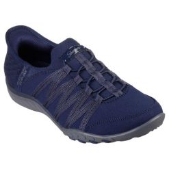 Buty sportowe Sneakersy damskie, Slip-ins: Breathe Easy - Roll With Me. Niebieskie obuwie sportowe damskie Skechers, bez wzorów, z gumy, bez zapięcia, trekkingowe. Za 379.99 zł.
