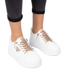Białe sneakersy trampki z szampańskimi cyrkoniami. Białe trampki i tenisówki damskie bez wzorów, z materiału, bez zapięcia. Za 84.03 zł.