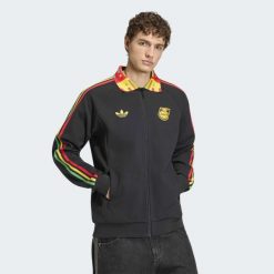 Kurtka dresowa Jamajka OG Anthem Coupe du Monde 2026. Czarne kurtki męskie Adidas, xs, bez wzorów, z dresówki, sportowe, bez kaptura. Za 529.00 zł.