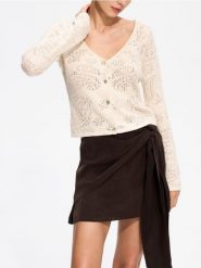 Crochetowy kardigan w autorski wzór - kremowy. Białe kardigany damskie Reserved, l, bez wzorów, z bawełny, bez kołnierzyka. Za 279.99 zł.