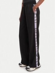 EA7 Emporio Armani Spodnie dresowe 7W001155 AF12501 UC001 Czarny Relaxed Fit. Czarne spodnie dresowe damskie EA7 Emporio Armani, bez wzorów, z dresówki. Za 529.99 zł.