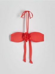 Góra od bikini - koralowy. Pomarańczowe stroje kąpielowe damskie Reserved, bez wzorów. W wyprzedaży za 35.99 zł.