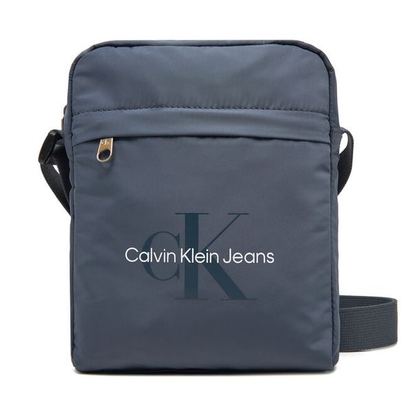 Saszetka Calvin Klein Jeans. Niebieskie saszetki i nerki męskie Calvin Klein Jeans, z jeansu, małe. Za 299.99 zł.