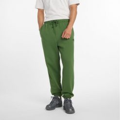 Spodnie męskie New Balance MP41508DAE – zielone. Zielone spodnie sportowe męskie New Balance, m, bez wzorów, z bawełny. Za 359.99 zł.