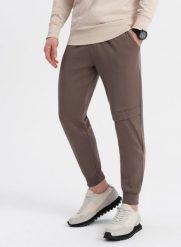 Ombre Spodnie męskie dresowe z przeszyciem i zamkiem na nogawce - brązowe V4 OM-PASK-0147 XL. Brązowe spodnie sportowe męskie Ombre, m, bez wzorów, z dresówki. Za 49.99 zł.