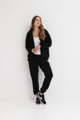 LEKKIE SPODNIE CELINE CZARNE S - Flawless. Czarne spodnie dresowe damskie Flawless, bez wzorów, z bawełny, klasyczne. Za 320.00 zł.