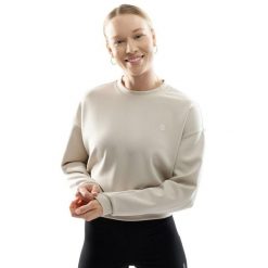 Bluza treningowa crop top dla kobiet Fitness Siroko Ignite. Brązowe bluzy damskie SIROKO, l, bez wzorów, z materiału, wakacyjne, bez ramiączek, bez kaptura. Za 148.00 zł.