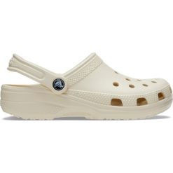 Klapki dla dorosłych Crocs Classic. Brązowe klapki damskie Crocs, bez wzorów, z materiału, sportowe, bez obcasa, bez zapięcia. Za 267.00 zł.