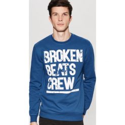 Bluza z nadrukiem - Niebieski. Niebieskie bluzy damskie House, l, bez wzorów, bez ramiączek, bez kaptura. Za 59.99 zł.