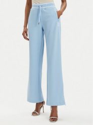 Juicy Couture Spodnie dresowe Kurt JCSBJ224418 Błękitny Regular Fit. Niebieskie spodnie dresowe damskie Juicy Couture, bez wzorów, z dresówki. Za 349.99 zł.