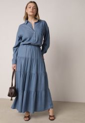 Niebieska Rozkloszowana Spódnica z Lyocellu z Wysokim Stanem i Falbanami Emorithia. Niebieskie spódnice damskie Born2be, na co dzień, bez wzorów, z lyocellu, klasyczne, z podwyższonym stanem, maxi, koszulowe. Za 89.99 zł.