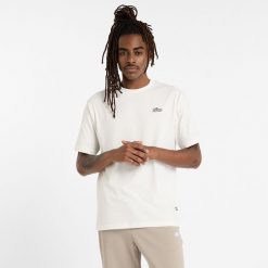 Koszulka męska New Balance MT51966SST – biała. Białe koszulki sportowe męskie New Balance, m, bez wzorów, z bawełny, bez ramiączek. Za 129.99 zł.