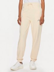 Hugo Spodnie dresowe Easy 50509171 Beżowy Relaxed Fit. Brązowe spodnie dresowe damskie Hugo, bez wzorów, z bawełny. Za 299.99 zł.