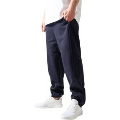 Spodnie Urban Classics basic. Niebieskie spodnie materiałowe męskie Urban Classics, bez wzorów. Za 198.00 zł.