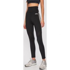 Adidas - Legginsy. Czarne legginsy damskie Adidas, bez wzorów, z dzianiny. Za 179.90 zł.