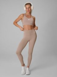 4F Legginsy treningowe szybkoschnące damskie - beżowe S. Brązowe legginsy damskie 4F, bez wzorów. Za 119.99 zł.