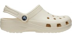 Klapki dla dorosłych Crocs Classic. Brązowe klapki damskie Crocs, bez wzorów, z materiału, bez obcasa, bez zapięcia. Za 287.00 zł.
