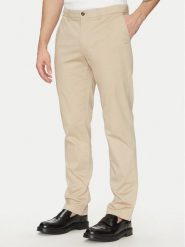 Tommy Hilfiger Chinosy Denton MW0MW37717 Beżowy Slim Fit. Brązowe eleganckie spodnie męskie Tommy Hilfiger, bez wzorów, z bawełny. Za 479.99 zł.