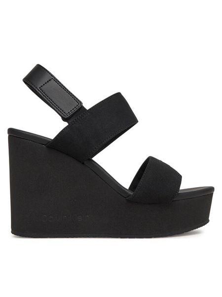 Calvin Klein Jeans Sandały Wedge Sandal Webbing In YW0YW01790 Czarny. Czarne sandały damskie Calvin Klein Jeans, bez wzorów, z jeansu, bez obcasa, na koturnie, bez zapięcia. Za 249.99 zł.