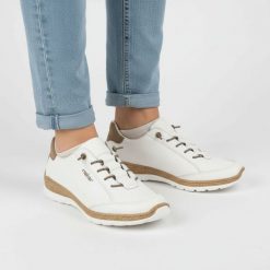 Półbuty damskie Rieker, cholewka ze skóry naturalnej gładkiej sportowa forma klasyczne sznurowanie lekka elastyczna podeszwa, białe, N42K5-80. Białe półbuty damskie Rieker, bez wzorów, ze skóry, klasyczne, bez obcasa, na płaskiej podeszwie, bez zapięcia. Za 369.00 zł.