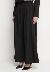 Czarne Spodnie o Fasonie Palazzo z Wsuwanymi Kieszeniami Adivena. Czarne spodnie materiałowe damskie Born2be, bez wzorów, z jeansu, eleganckie, z podwyższonym stanem, długie. Za 74.99 zł.