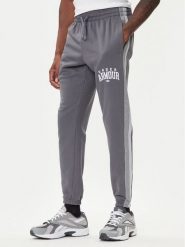 Under Armour Spodnie dresowe Ua Rival Fleece Colorblock 6003954 Szary Loose Fit. Szare spodnie sportowe męskie Under Armour, l, bez wzorów, z bawełny. Za 209.99 zł.